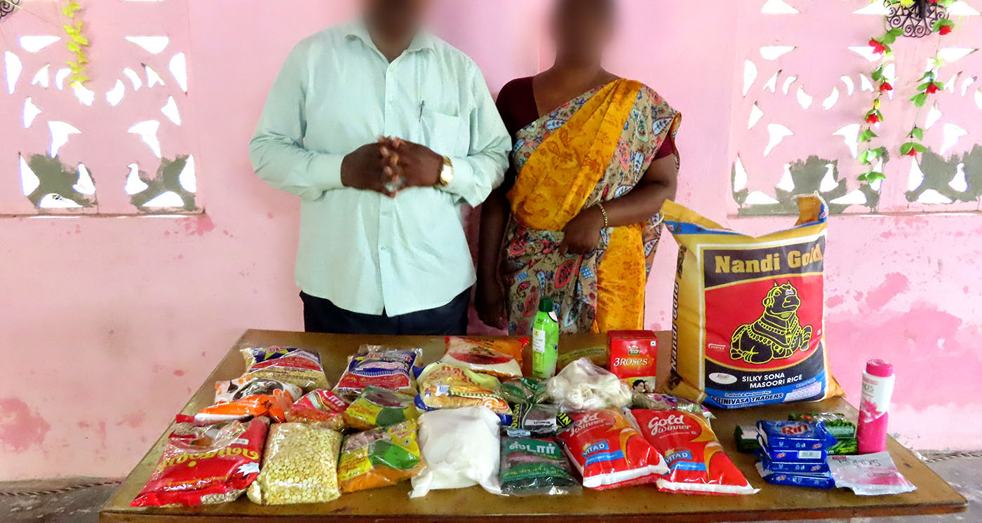 Two Indian Christians with food aid