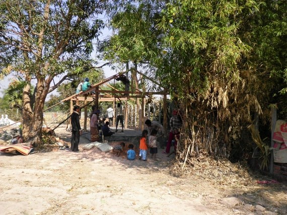 2015-06-29-1435555617-4363760-villagershelpingbuildchurchframing.jpg